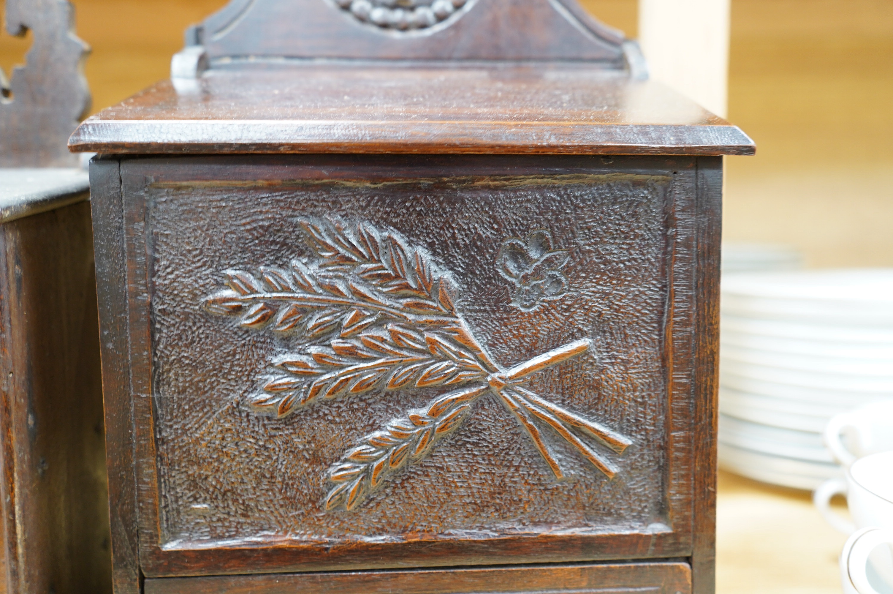 Two 19th century carved beech salt boxes, largest 40cm high. Condition - fair